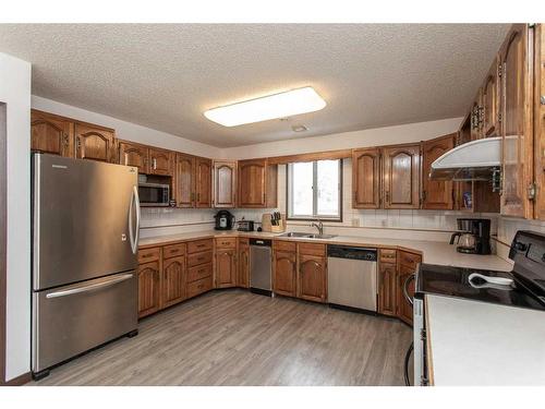 5214 Silverpark Close, Olds, AB - Indoor Photo Showing Kitchen With Stainless Steel Kitchen With Double Sink