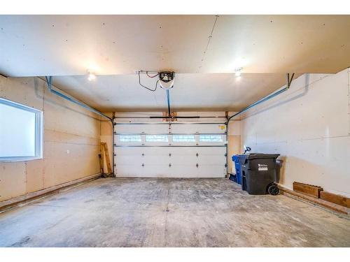 84 Vanson Close, Red Deer, AB - Indoor Photo Showing Garage