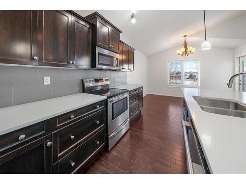 84 Vanson Close, Red Deer, AB - Indoor Photo Showing Kitchen With Double Sink With Upgraded Kitchen