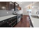 84 Vanson Close, Red Deer, AB  - Indoor Photo Showing Kitchen With Double Sink With Upgraded Kitchen 