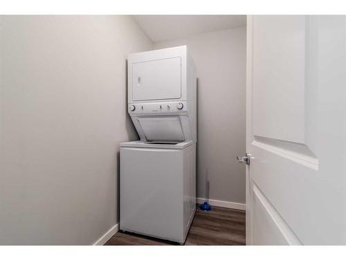 200-44 Reid Court, Sylvan Lake, AB - Indoor Photo Showing Laundry Room