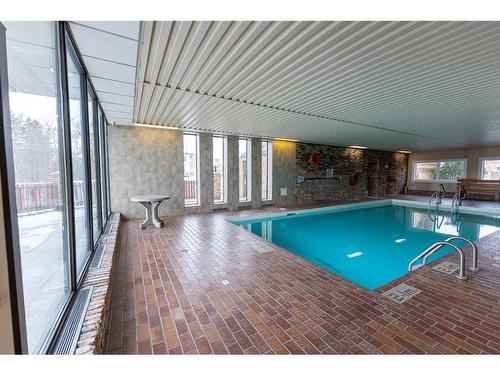 912-4902 37 Street, Red Deer, AB - Indoor Photo Showing Other Room With In Ground Pool