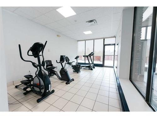 912-4902 37 Street, Red Deer, AB - Indoor Photo Showing Gym Room