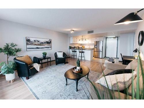 912-4902 37 Street, Red Deer, AB - Indoor Photo Showing Living Room