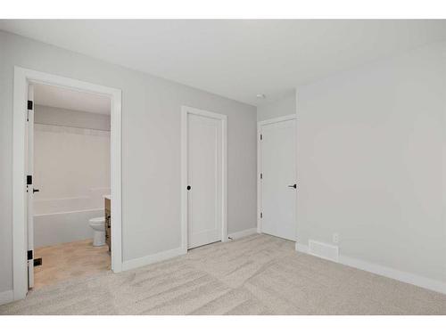 15 Gray Close, Sylvan Lake, AB - Indoor Photo Showing Other Room