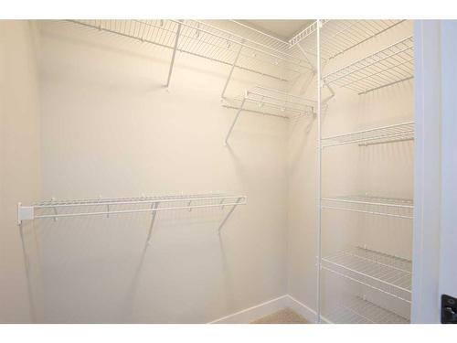 15 Gray Close, Sylvan Lake, AB - Indoor With Storage