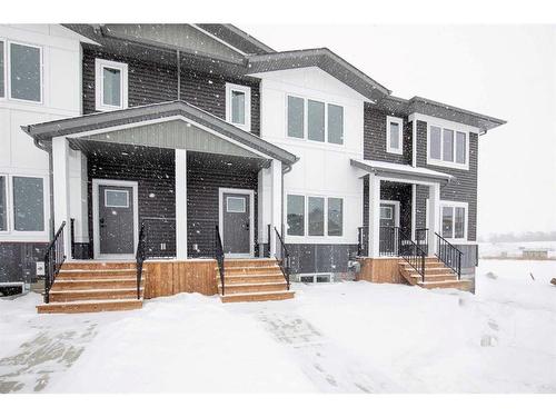 15 Gray Close, Sylvan Lake, AB - Outdoor With Facade