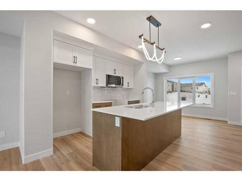 15 Gray Close, Sylvan Lake, AB - Indoor Photo Showing Kitchen With Double Sink