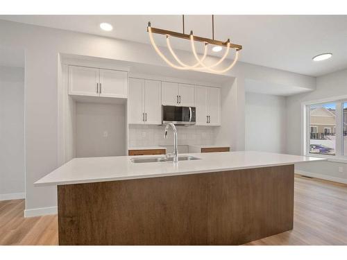 15 Gray Close, Sylvan Lake, AB - Indoor Photo Showing Kitchen With Double Sink