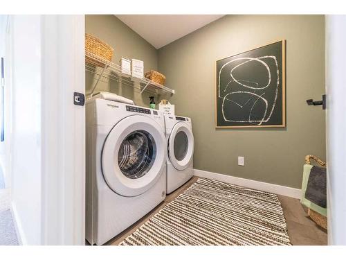 927 Langholm Drive Se, Airdrie, AB - Indoor Photo Showing Laundry Room