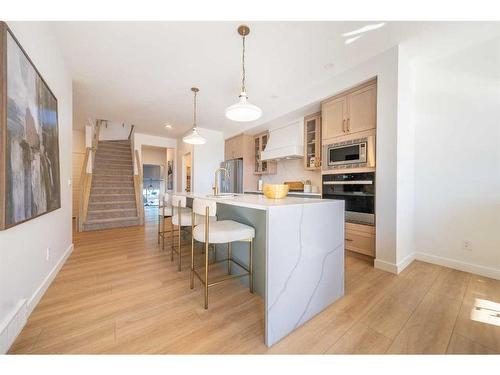 927 Langholm Drive Se, Airdrie, AB - Indoor Photo Showing Kitchen