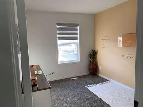 31 Creekside Grove Sw, Calgary, AB - Indoor Photo Showing Other Room