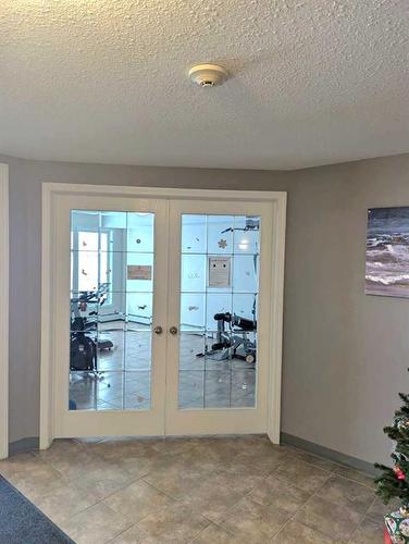 109-3 Broadway Rise, Sylvan Lake, AB - Indoor Photo Showing Other Room