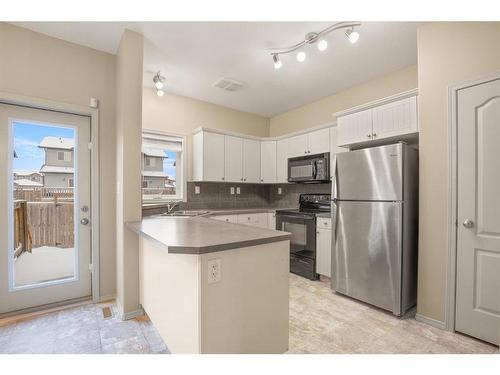 21 Pinetree Close, Blackfalds, AB - Indoor Photo Showing Kitchen