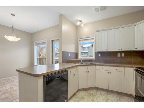 21 Pinetree Close, Blackfalds, AB - Indoor Photo Showing Kitchen With Double Sink