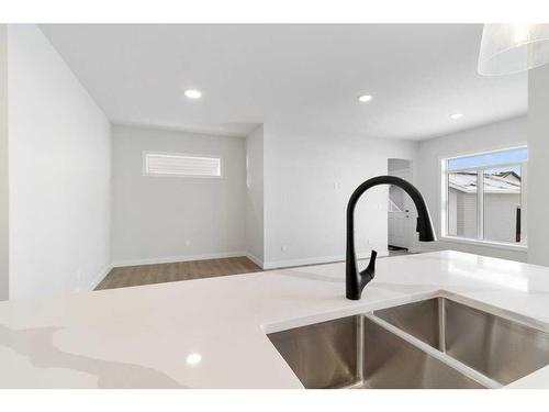 7 Ian Way, Sylvan Lake, AB - Indoor Photo Showing Kitchen With Double Sink