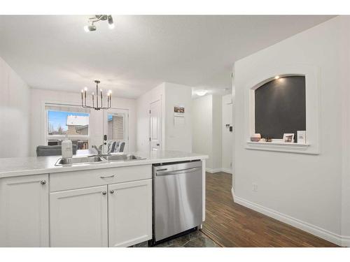 67 Ponderosa Avenue, Blackfalds, AB - Indoor Photo Showing Kitchen With Double Sink