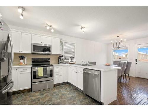 67 Ponderosa Avenue, Blackfalds, AB - Indoor Photo Showing Kitchen With Stainless Steel Kitchen