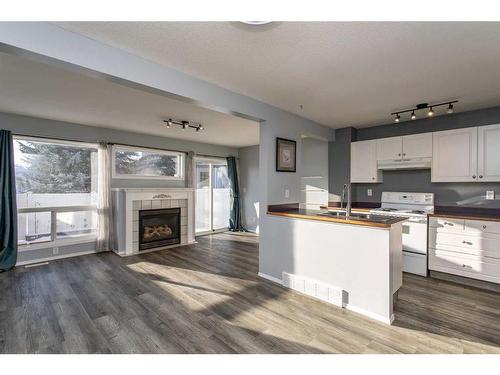 22-6300 Orr Drive, Red Deer, AB - Indoor With Fireplace