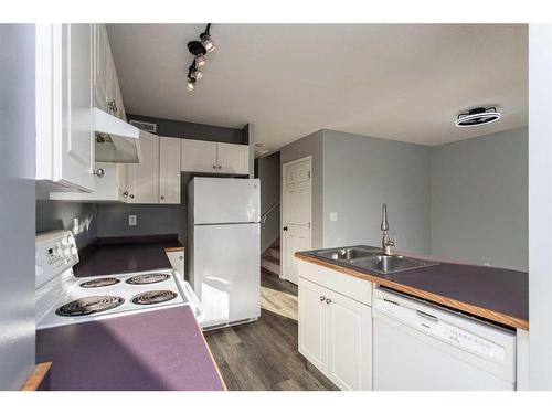 22-6300 Orr Drive, Red Deer, AB - Indoor Photo Showing Kitchen With Double Sink