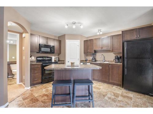 1013-31 Jamieson Avenue, Red Deer, AB - Indoor Photo Showing Kitchen