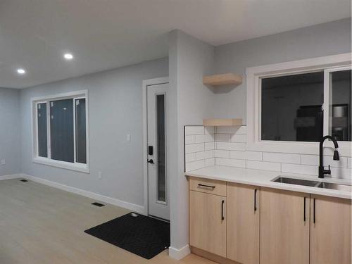 3305 44A Avenue, Red Deer, AB - Indoor Photo Showing Kitchen With Double Sink