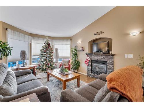 36 Van Dorp Street, Red Deer, AB - Indoor Photo Showing Living Room With Fireplace