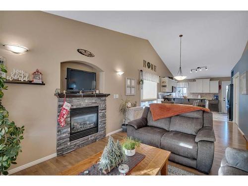 36 Van Dorp Street, Red Deer, AB - Indoor Photo Showing Living Room With Fireplace