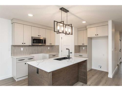 14 Artemis Place, Blackfalds, AB - Indoor Photo Showing Kitchen With Double Sink