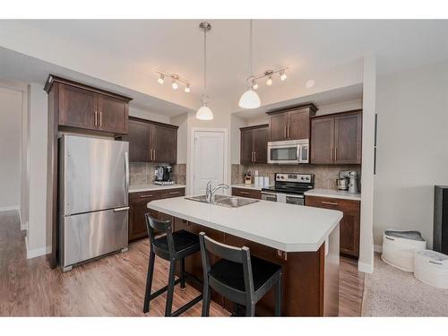 32 Tallman Close, Red Deer, AB - Indoor Photo Showing Kitchen With Double Sink