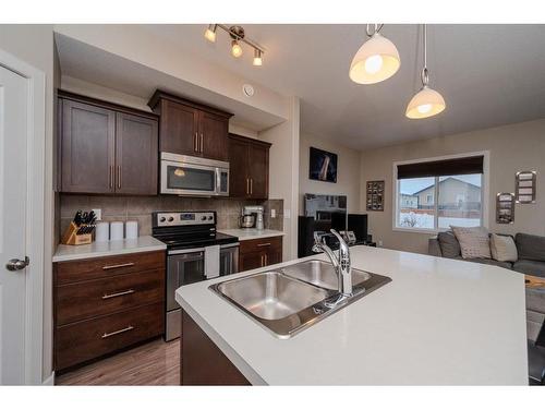 32 Tallman Close, Red Deer, AB - Indoor Photo Showing Kitchen With Double Sink