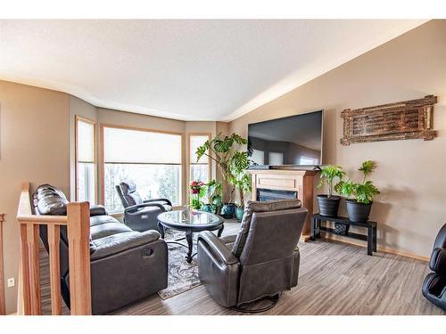 13 Leung Close, Red Deer, AB - Indoor Photo Showing Living Room With Fireplace