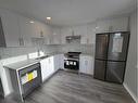 19 Erin Croft Crescent Se, Calgary, AB  - Indoor Photo Showing Kitchen With Stainless Steel Kitchen With Upgraded Kitchen 