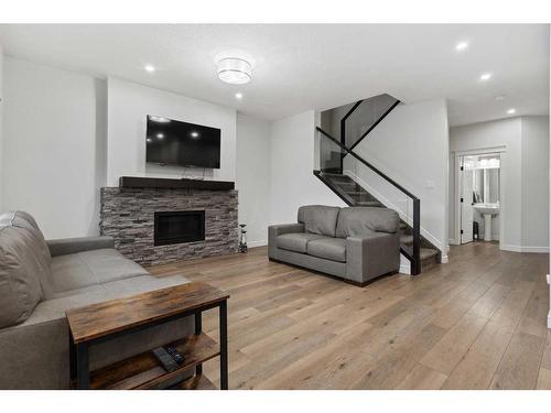 1090 Christie Vista Sw, Edmonton, AB - Indoor Photo Showing Living Room With Fireplace