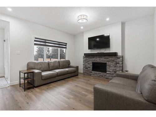 1090 Christie Vista Sw, Edmonton, AB - Indoor Photo Showing Living Room With Fireplace