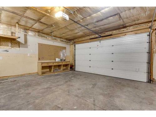 12 Hagerman Close, Sylvan Lake, AB - Indoor Photo Showing Garage