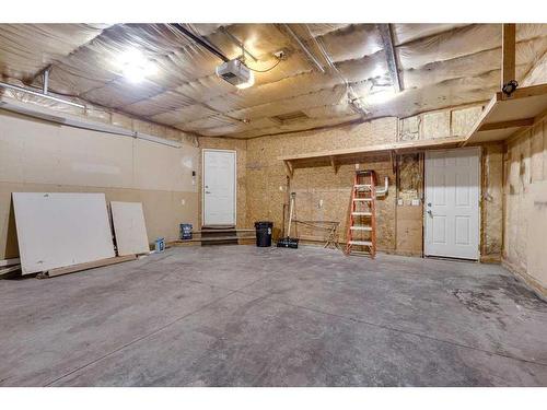 12 Hagerman Close, Sylvan Lake, AB - Indoor Photo Showing Garage