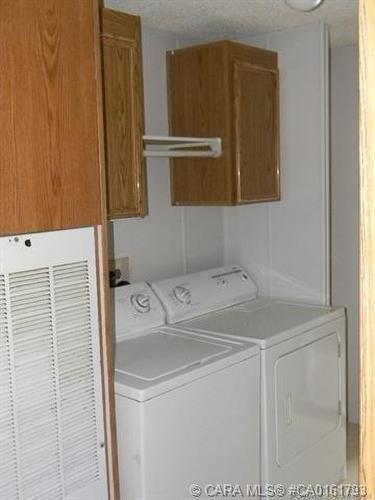 59-5311 60 Street, Rocky Mountain House, AB - Indoor Photo Showing Laundry Room