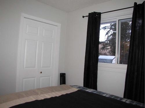 5223 37 Street, Innisfail, AB - Indoor Photo Showing Bedroom