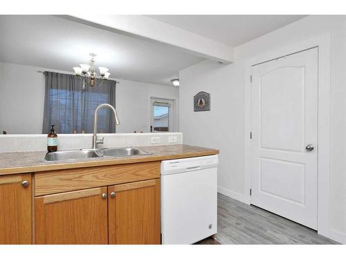 4514 44 Avenue Close, Rocky Mountain House, AB - Indoor Photo Showing Kitchen With Double Sink