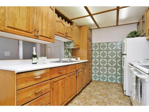 4710 53 Avenue, Rimbey, AB - Indoor Photo Showing Kitchen With Double Sink