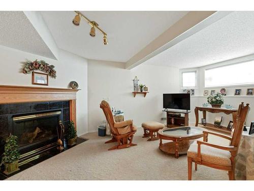 13825 130 Avenue Nw, Edmonton, AB - Indoor Photo Showing Living Room With Fireplace