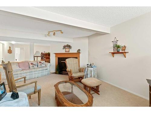 13825 130 Avenue Nw, Edmonton, AB - Indoor Photo Showing Living Room With Fireplace