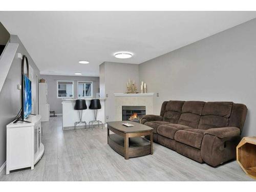 340 Drummond Avenue, Red Deer, AB - Indoor Photo Showing Living Room With Fireplace