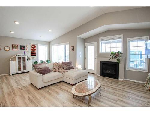 23 Golden Crescent, Red Deer, AB - Indoor Photo Showing Living Room With Fireplace