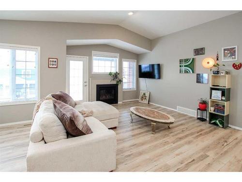 23 Golden Crescent, Red Deer, AB - Indoor Photo Showing Living Room With Fireplace