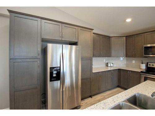 23 Golden Crescent, Red Deer, AB - Indoor Photo Showing Kitchen With Stainless Steel Kitchen With Double Sink