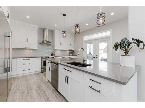 101 Lazaro Close, Red Deer, AB - Indoor Photo Showing Kitchen With Double Sink With Upgraded Kitchen