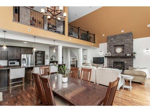 431 Summer Crescent, Rural Ponoka County, AB - Indoor Photo Showing Dining Room With Fireplace