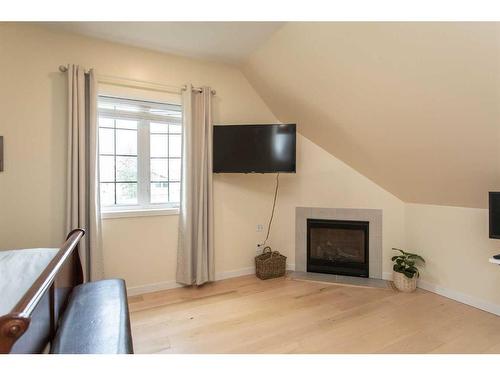 431 Summer Crescent, Rural Ponoka County, AB - Indoor Photo Showing Living Room With Fireplace